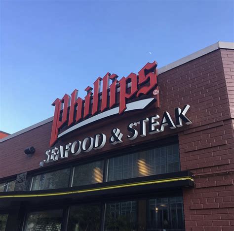 Phillips seafood restaurant - Charmtastic Mile Baltimore June 16, 2019. Phillips Seafood has introduced the Iconic restaurant brand to The Charm'tastic Mile with its new address Phillips Seafood - The Charm'tastic Mile - 601 E. Pratt St. - Baltimore, MD. 21202. Upvote 1 Downvote.